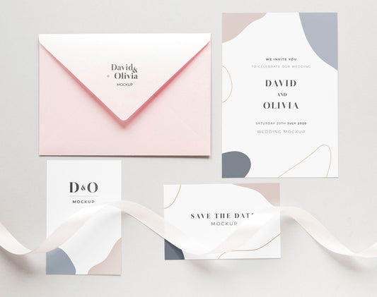 Free Fat Lay Of Wedding Cards With Envelope And Ribbon Psd