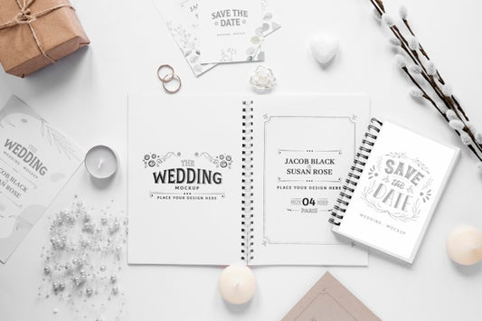 Free Fat Lay Of Wedding Notebooks With Gift And Candles Psd