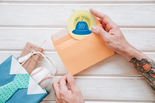 Free Fathers Day Mockup With Round Label In Envelope And Arms Psd