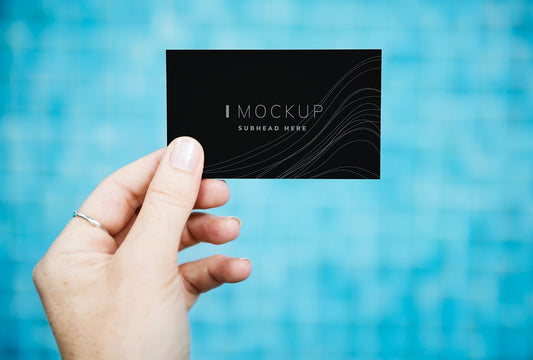 Free Female Hand Holding A Business Card Mockup