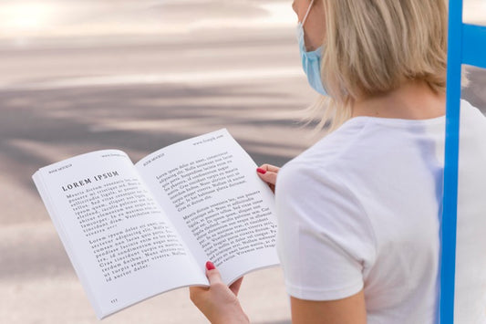 Free Female With Mask On Street Reading Book Psd