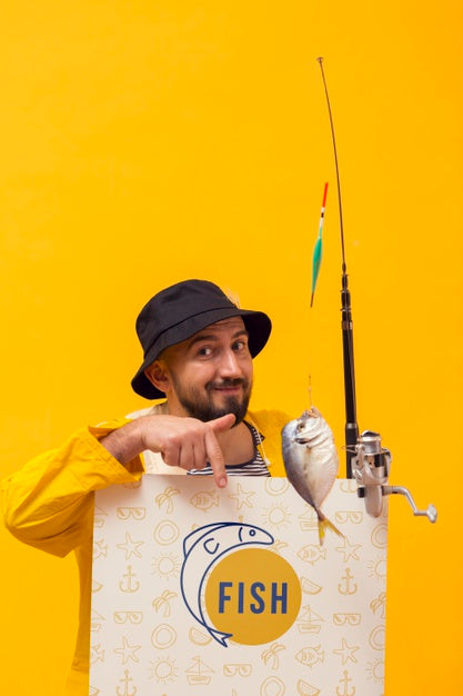 Free Fisherman In Raincoat Holding Rod With Fish Psd