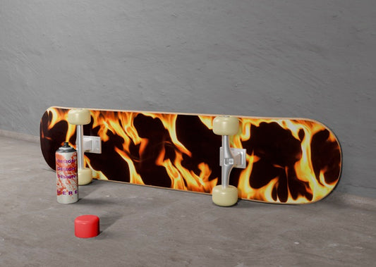 Free Flame Design Skateboard Next To Spray Can Psd