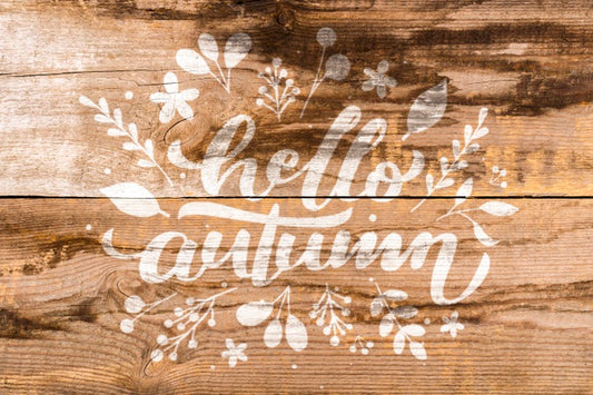 Free Flat Lay Autumn Lettering On Wooden Background Psd
