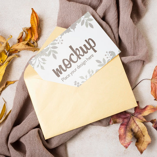 Free Flat Lay Autumn Mock-Up With Leaves On Grey Cloth Psd
