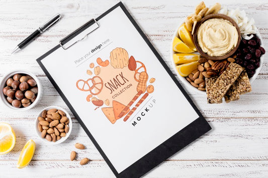 Free Flat Lay Composition Of Snacks With Clipboard Mock-Up Psd