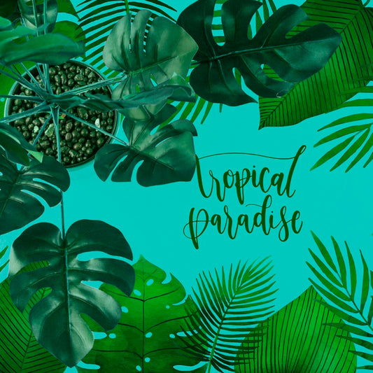Free Flat Lay Copyspace Mockup With Tropical Leaves Psd