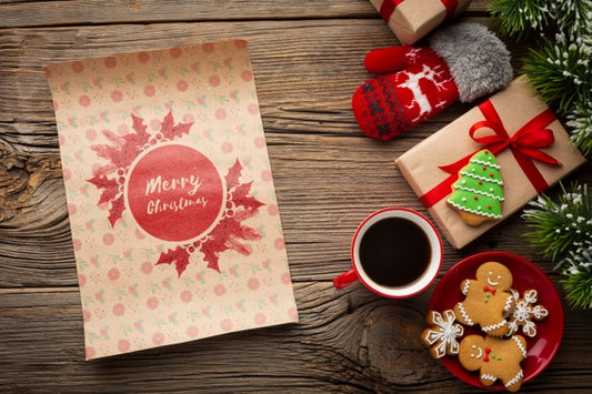 Free Flat Lay Cup Of Coffee With Gingerbread And Christmas Gifts Psd