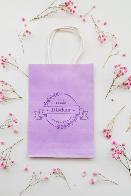 Free Flat Lay Flowers And Paper Bag Arrangement Psd