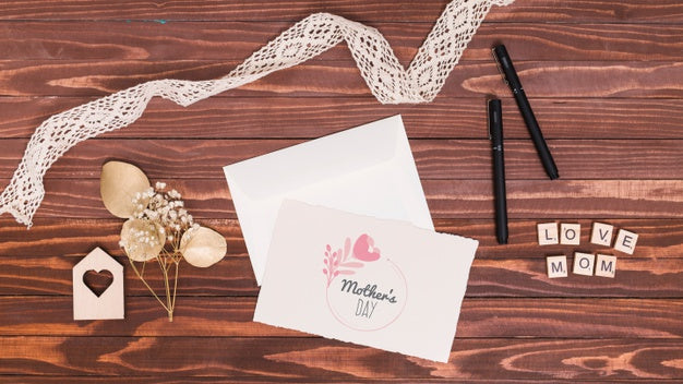 Free Flat Lay Mothers Day Composition With Card Mockup Psd