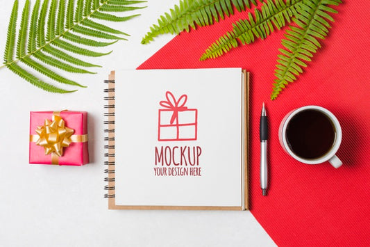Free Flat Lay Notebook Mock-Up Next To Birthday Gift Psd