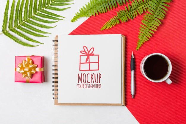 Free Flat Lay Notebook Mock-Up Next To Birthday Gift Psd