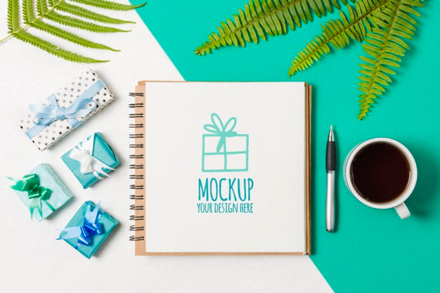 Free Flat Lay Notebook Mock-Up Next To Birthday Gifts Psd