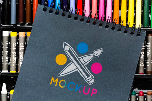 Free Flat Lay Notebook On Colorful Markers Psd
