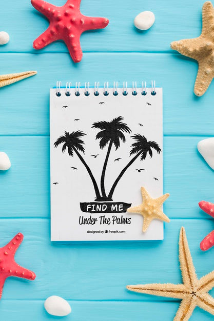 Free Flat Lay Notepad With Palm Trees And Starfishes Psd