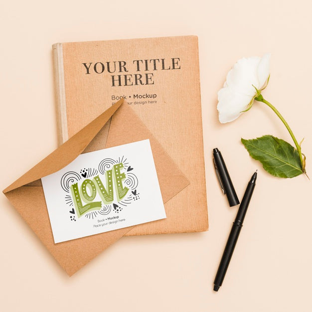 Free Flat Lay Of Book With Flower And Card Psd