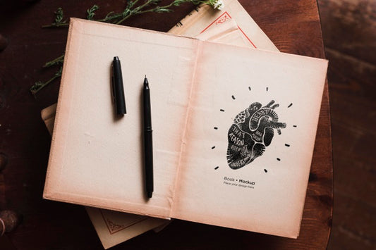 Free Flat Lay Of Books With Pen And Flowers Psd
