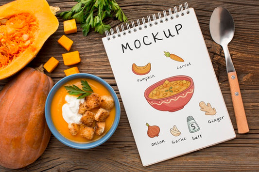 Free Flat Lay Of Bowl Of Vegetable Soup With Notebook Psd