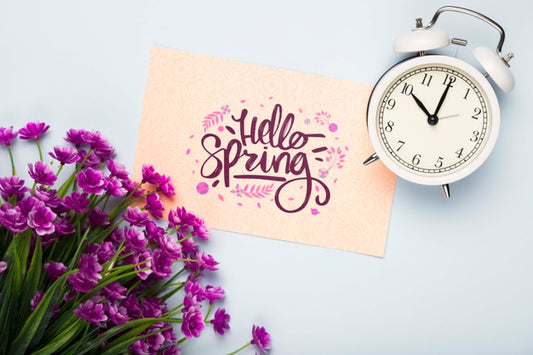 Free Flat Lay Of Card With Clock And Flowers Psd