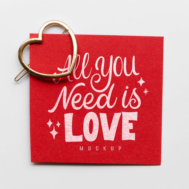 Free Flat Lay Of Card With Heart-Shaped Golden Pin Psd