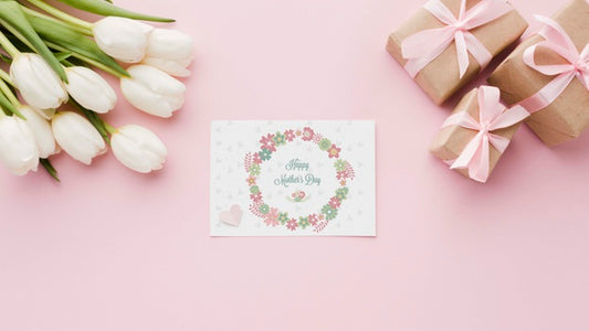 Free Flat Lay Of Card With Tulips And Presents Psd