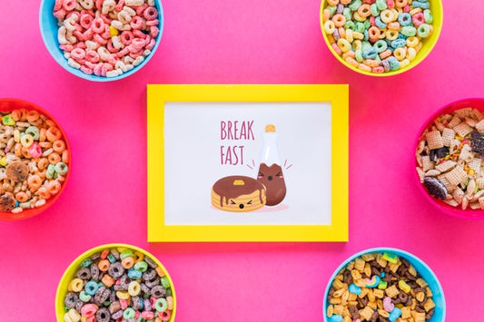 Free Flat Lay Of Cereal Bowls And Frame With Pink Background Psd