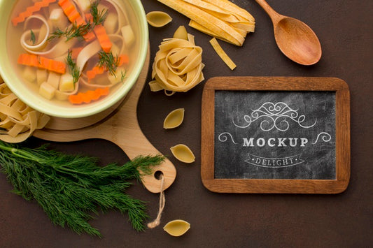 Free Flat Lay Of Chalkboard With Bowl Of Soup Psd