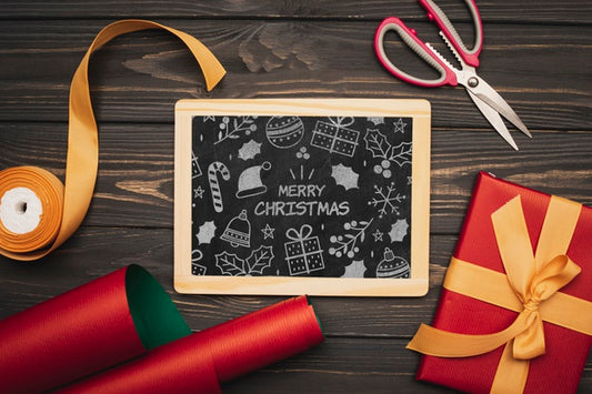 Free Flat Lay Of Christmas Concept Chalkboard On Wooden Table Psd