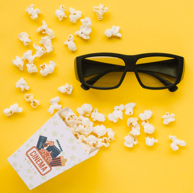 Free Flat Lay Of Cinema Popcorn In Cup With Glasses Psd