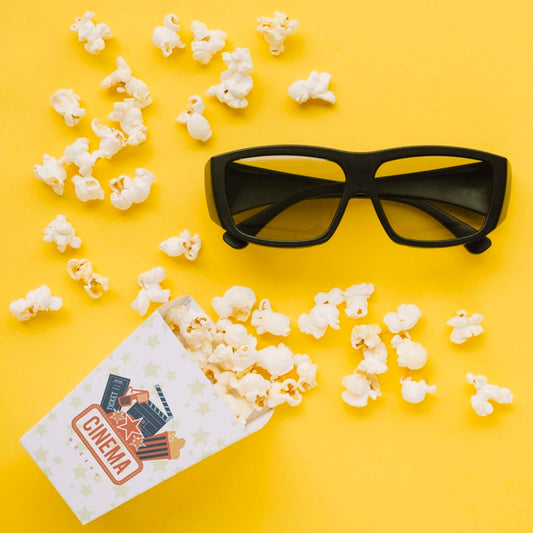 Free Flat Lay Of Cinema Popcorn In Cup With Glasses Psd