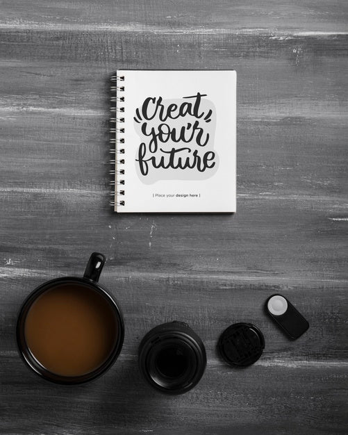 Free Flat Lay Of Desk Surface With Notebook And Coffee Psd