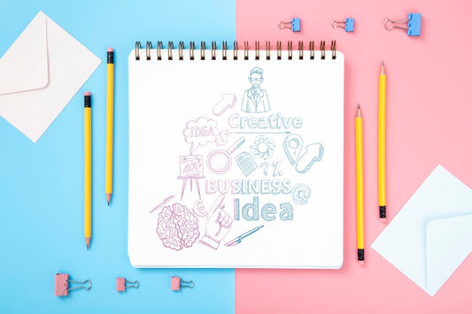 Free Flat Lay Of Desk Surface With Pencils And Notebook Psd