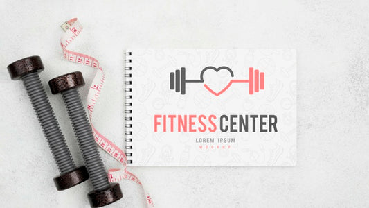Free Flat Lay Of Fitness Notebook With Weights And Measuring Tape Psd
