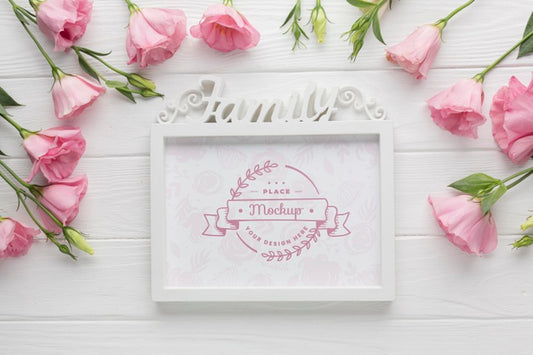 Free Flat Lay Of Frame With Pink Roses Psd