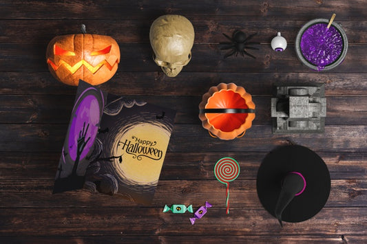 Free Flat Lay Of Halloween Elements On Wooden Background Psd