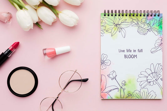 Free Flat Lay Of Notebook With Tulips And Make-Up Essentials Psd
