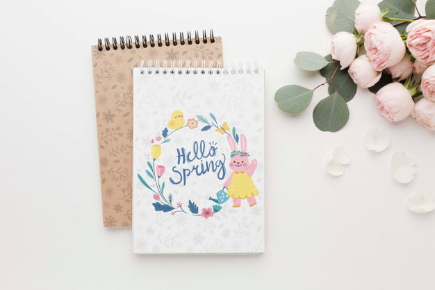 Free Flat Lay Of Notebooks With Spring Roses Psd