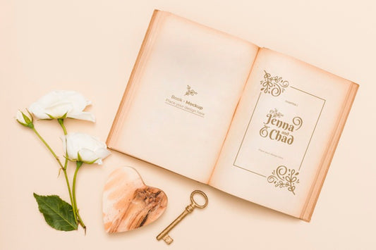 Free Flat Lay Of Open Book With Roses And Key Psd