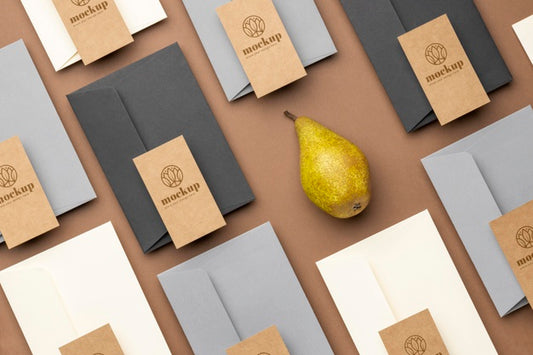Free Flat Lay Of Paper Stationery With Pear Psd