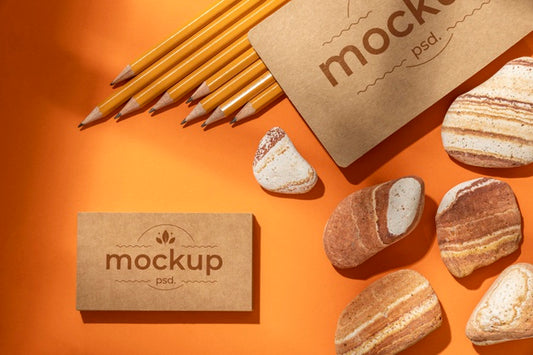 Free Flat Lay Of Paper Stationery With Pencils And Rocks Psd