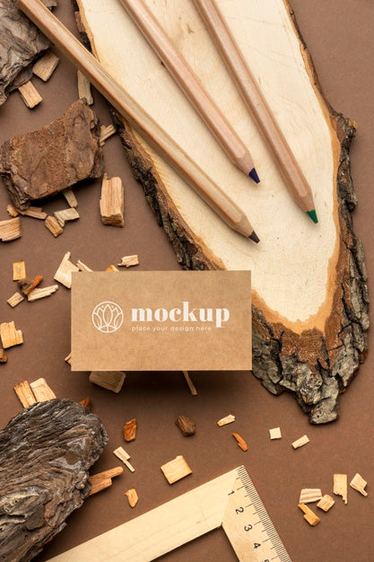 Free Flat Lay Of Paper Stationery With Wood And Pencils Psd