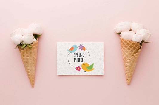 Free Flat Lay Of Roses In Ice Cream Cones With Card Psd