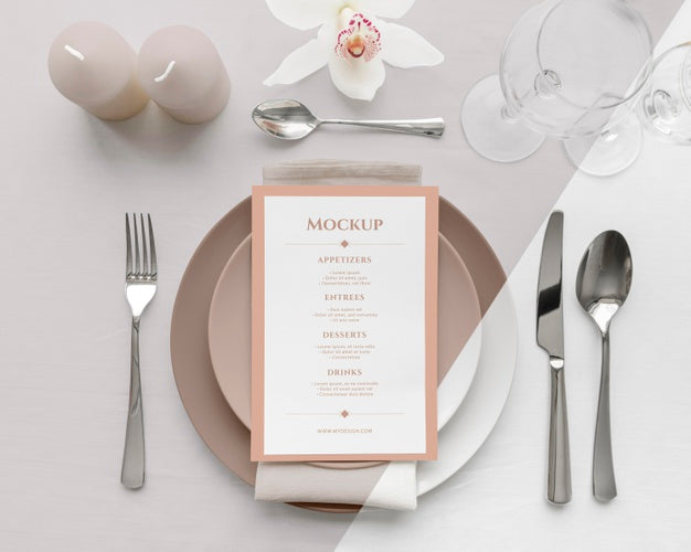 Free Flat Lay Of Spring Menu Mock-Up On Plates With Candles And Cutlery Psd