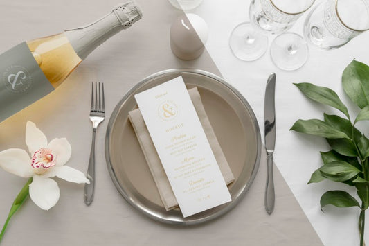 Free Flat Lay Of Spring Menu Mock-Up On Plates With Wine Bottle And Cutlery Psd