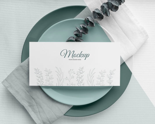 Free Flat Lay Of Spring Menu Mock-Up With Leaves On Plates Psd