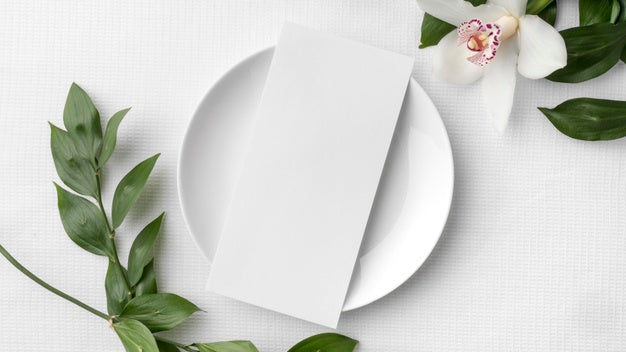 Free Flat Lay Of Spring Menu Mock-Up With Plate And Flower Psd