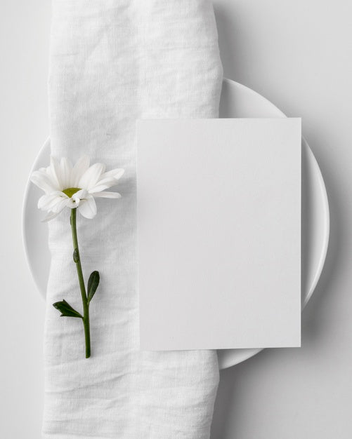 Free Flat Lay Of Table Arrangement With Spring Menu Mock-Up On Plate And Towel Psd