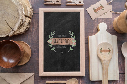 Free Flat Lay Of Wooden Dishes With Blackboard Psd