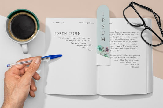 Free Flat Lay Open Book And Bookmark Mock-Up With Coffee Psd
