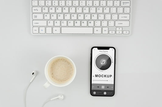 Free Flat Lay Smartphone Mock-Up With Cup And Earphones On Desk Psd